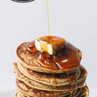 a stack of healthy pancakes with a maple syrup drizzle
