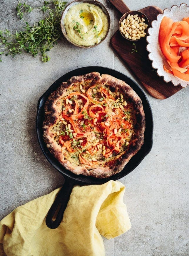 Carrot, Pine Nut, & Parmesan Skillet Pizza with Creamy Roasted Garlic Sauce