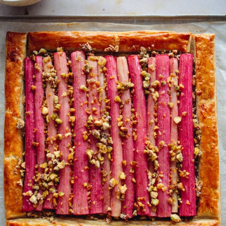 Simple Rhubarb Tart with chopped pistachios by Izy Hossack