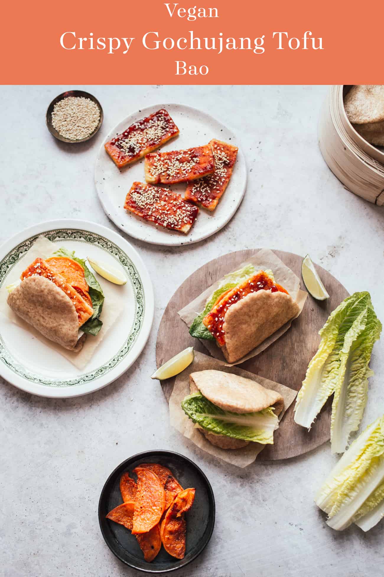 Bao buns filled with crispy gochujang tofu and lettuce with a bamboo steamer" data-pin-description="Crispy tofu with a sweet & spicy gochujang sauce in soft, fluffy bao buns. Great for a plant-based dinner!