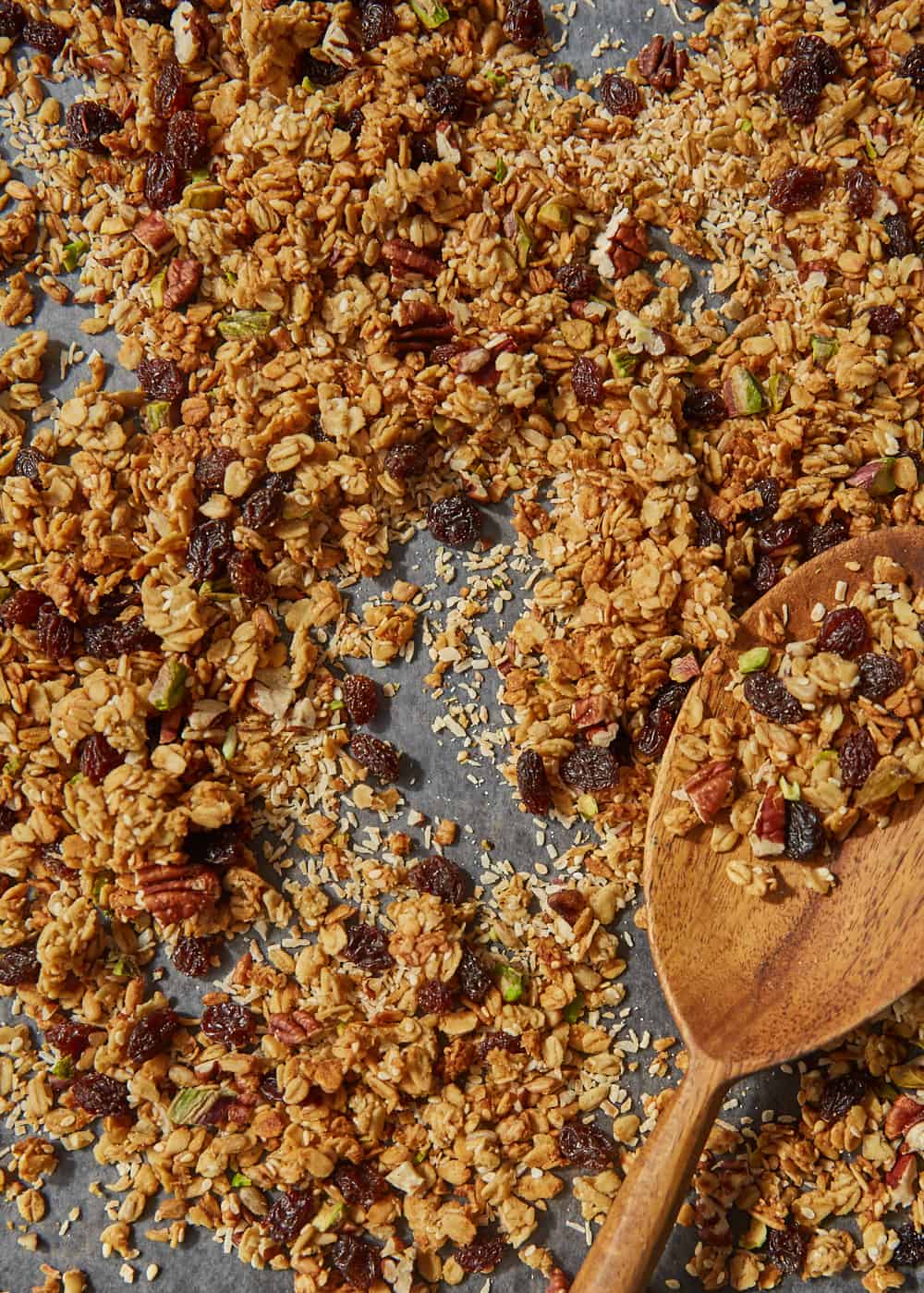 a tray of the best granola with pecans, pistachios, coconut & raisins