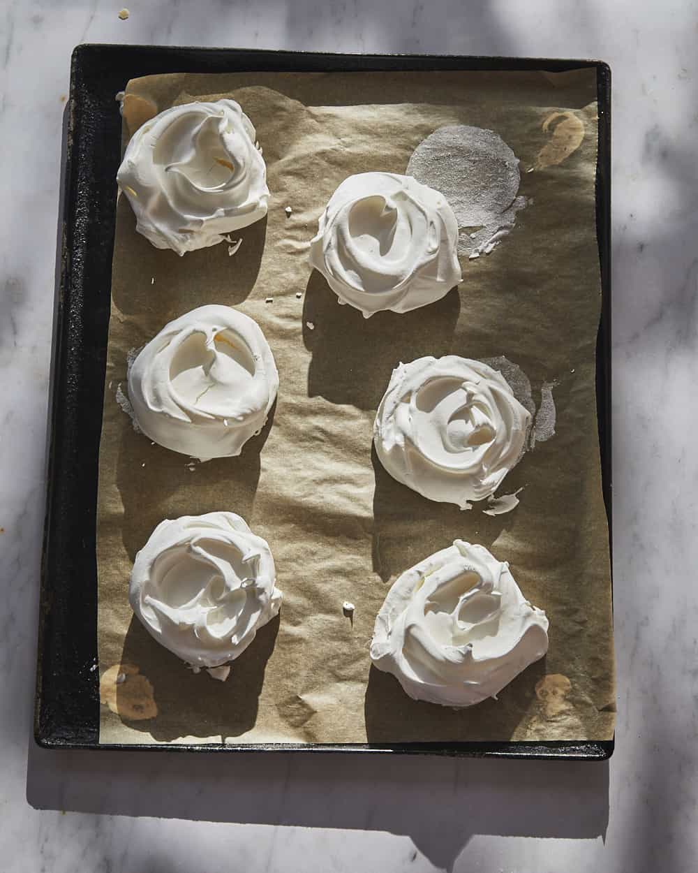 baked meringues on a tray