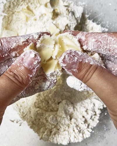 rubbing butter into the flour